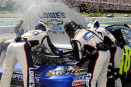 LONG POND, PA - AUGUST 03:  The #48 crew changes a carburetor on the Lowes Chevrolet, driven by Jimmie Johnson, during the NASCAR Sprint Cup Series Sunoco Red Cross Pennsylvania 500 at the Pocono Raceway on August 3, 2009 in Long Pond, Pennsylvania.  (Photo by Rusty Jarrett/Getty Images for NASCAR)