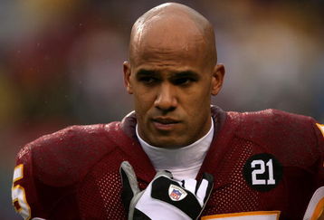 LANDOVER, MD - NOVEMBER 30:  Jason Taylor #55 of the Washington Redskins stands on the sidelines during their game against the New York Giants at FedEx Field on November 30, 2008 in Landover, Maryland.  (Photo by Streeter Lecka/Getty Images)