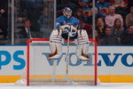 ATLANTA  -  MARCH 8:  Goalie Kari Lehtonen #32 of the Atlanta Thrashers relaxes on top of the goal during a break in the action against the Montreal Canadiens on March 8, 2007 at Philips Arena in Atlanta, Georgia. The Thrashers defeattttted the Canadiens 6-2. (Photo by Scott Cunningham/Getty Images)  