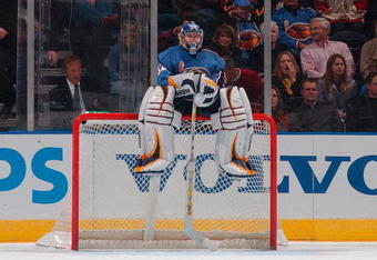 ATLANTA  -  MARCH 8:  Goalie Kari Lehtonen #32 of the Atlanta Thrashers relaxes on top of the goal during a break in the action against the Montreal Canadiens on March 8, 2007 at Philips Arena in Atlanta, Georgia. The Thrashers defeattttted the Canadiens 6-2. (Photo by Scott Cunningham/Getty Images)  