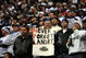 IRVING, TX - DECEMBER 20: A Dallas Cowboys fan holds a sign for former coach Tom Landry at Texas Stadium on December 20, 2008 in Irving, Texas.  (Photo by Ronald Martinez/Getty Images)