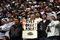IRVING, TX - DECEMBER 20: A Dallas Cowboys fan holds a sign for former coach Tom Landry at Texas Stadium on December 20, 2008 in Irving, Texas.  (Photo by Ronald Martinez/Getty Images)