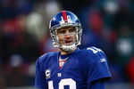 EAST RUTHERFORD, NJ -  JANUARY 11:  Eli Manning #10 of the New York Giants looks on against the Philadelphia Eagles during the NFC Divisional Playoff Game on January 11, 2009 at Giants Stadium in East Rutherford, New Jersey.  The Eagles defeated the Giants 23 -11. (Photo by Chris McGrath/Getty Images)