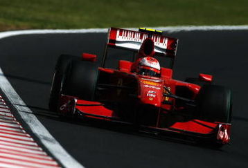 BUDAPEST, HUNGARY - JULY 26:  Kimi Raikkonen of Finland and Ferrari drives on his way to finishing in second place during the Hungarian Formula One Grand Prix at the Hungaroring on July 26, 2009 in Budapest, Hungary.  (Photo by Paul Gilham/Getty Images)