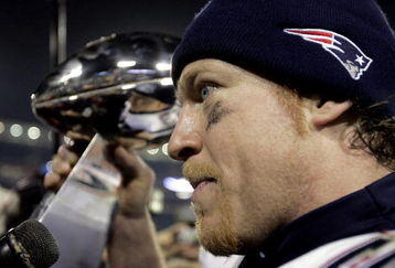JACKSONVILLE, F - FEBRUARY 6:  Linebacker Larry Izzo #53 of the New England Patriots celebrates with the Lombardi Trophy after defeating the Philadelphia Eagles in Super Bowl XXXIX at Alltel Stadium on February 6, 2005 in Jacksonville, Florida.  The Patriots defeated the Eagles 24-21.  (Photo by Brian Bahr/Getty Images)