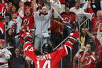 NEWARK, NJ - APRIL 28: Brian Gionta #14 of the New Jersey Devils celebrates a goal by Brian Rolston #12 (not shown) against the Carolina Hurricanes during Game Seven of the Eastern Conference Semifinal Round of the 2009 Stanley Cup Playoffs at the Prudential Center on April 28, 2009 in Newark, New Jersey. The Hurricanes defetaed the Devils 4-3.  (Photo by Bruce Bennett/Getty Images)