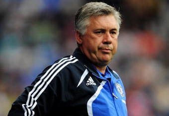 READING, ENGLAND - AUGUST 01: Chelsea coach Carlo Ancelotti looks on during the pre-season friendly match between Reading and Chelsea at the Madejski Stadium on August 1, 2009 in Reading, England.  (Photo by Shaun Botterill/Getty Images)