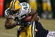CHICAGO - DECEMBER 22: DeShawn Wynn #42 of the Green Bay Packers breaks away from Cory Graham #21 of the Chicago Bears on December 22, 2008 at Soldier Field in Chicago, Illinois. The Bears defeated the Packers 20-17 in overtime. (Photo by Jonathan Daniel/Getty Images)
