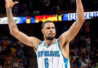 NEW ORLEANS - DECEMBER 17: Tyson Chandler #6 of the New Orleans Hornets celebrates during the game against the San Antonio Spurs on December 17, 2008 at the New Orleans Arena in New Orleans, Louisiana. NOTE TO USER: User expressly acknowledges and agrees that, by downloading and/or using this Photograph, user is consenting to the terms and conditions of the Getty Images License Agreement. (Photo by Chris Graythen/Getty Images)