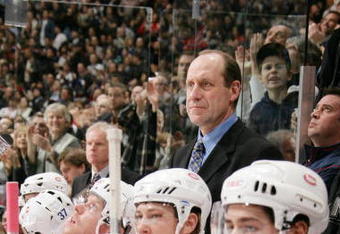 VANCOUVER - JANUARY 21:  Head Coach Bob Gainey of the Montreal Canadiens looks on from the bench during the NHL game against the Vancouver Canucks on January 21, 2006 at General Motors Place in Vancouver, Canada. The Canucks defeated the Canadiens 6-2.  (Photo by Jeff Vinnick/Getty Images)
