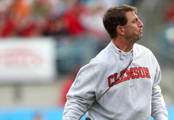 JACKSONVILLE, FL - JANUARY 1:  Head coach Dabo Swinney of the Clemson Tigers throws his headset during the Konica Minolta Gator Bowl against the Nebraska Cornhuskers at Jacksonville Municipal Stadium January 1, 2009 in Jacksonville, Florida.  (Photo by Sam Greenwood/Getty Images)