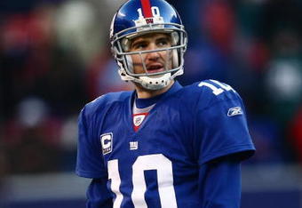 EAST RUTHERFORD, NJ -  JANUARY 11:  Eli Manning #10 of the New York Giants looks on against the Philadelphia Eagles during the NFC Divisional Playoff Game on January 11, 2009 at Giants Stadium in East Rutherford, New Jersey.  The Eagles defeated the Giants 23 -11. (Photo by Chris McGrath/Getty Images)