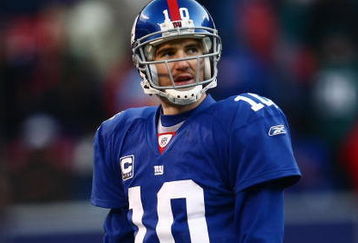 EAST RUTHERFORD, NJ -  JANUARY 11:  Eli Manning #10 of the New York Giants looks on against the Philadelphia Eagles during the NFC Divisional Playoff Game on January 11, 2009 at Giants Stadium in East Rutherford, New Jersey.  The Eagles defeated the Giants 23 -11. (Photo by Chris McGrath/Getty Images)