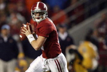 TUSCALOOSA, AL - NOVEMBER 29:  Quarterback Greg McElroy #12 of the Alabama Crimson Tide rolls out to pass against the Auburn Tigers at Bryant-Denny Stadium on November 29, 2008 in Tuscaloosa, Alabama. Alabama defeated Auburn 36-0.  (Photo by Doug Benc/Getty Images)