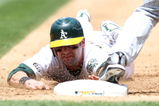 OAKLAND, CA - JUNE 11:  Adam Kennedy #29 of the Oakland Athletics is doubled off first base on a ball hit by Matt Holliday in the fourth inning against the Minnesota Twins during a Major League Baseball game on June 11, 2009 at the Oakland Coliseum in Oakland, California.  (Photo by Jed Jacobsohn/Getty Images)