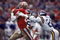SAN FRANCISCO - DECEMBER 8:  Wide receiver Dwight Clark #87 of the San Francisco 49ers catches a pass against defensive back Rufus Bess #21 of the Minnesota Vikings during a game at Candlestick Park on December 8, 1984 in San Francisco, California.  The 49ers won 51-7.  (Photo by George Rose/Getty Images)