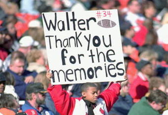 6 Nov 1999:  A young fan holds up a sign during Walter Payton's Memorial Service at Soldier Field in Chicago, Illinois. Mandatory Credit: Jonathan Daniel  /Allsport