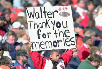 6 Nov 1999:  A young fan holds up a sign during Walter Payton's Memorial Service at Soldier Field in Chicago, Illinois. Mandatory Credit: Jonathan Daniel  /Allsport