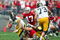 COLUMBUS, OH - SEPTEMBER 24:  Quarterback Drew Tate #5 of Iowa is sacked by Mike Kudla #57 of Ohio State as A.J. Hawak #47 of Ohio State and Marshal Yanda #73 of Iowa look on during the second quarter on September 24, 2005 at Ohio Stadium in Columbus, Ohio.  (Photo by Harry How/Getty Images)