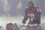 4 Oct 1998:  Outside lineback Derrick Thomas #58 of the Kansas City Chiefs sits on the field in the rain during a game against the Seattle Seahawks at the Arrowhead Stadium in Kansas City, Missouri. The Chiefs defeated the Seahawks 17-6.