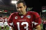TAMPA, FL - FEBRUARY 01:  Kurt Warner #13 of the Arizona Cardinals takes his gloves off as he leaves the field after the Cardinals lost 27-23 against the Pittsburgh Steelers during Super Bowl XLIII on February 1, 2009 at Raymond James Stadium in Tampa, Florida.  (Photo by Al Bello/Getty Images)