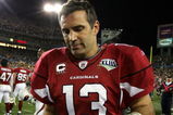 TAMPA, FL - FEBRUARY 01:  Kurt Warner #13 of the Arizona Cardinals takes his gloves off as he leaves the field after the Cardinals lost 27-23 against the Pittsburgh Steelers during Super Bowl XLIII on February 1, 2009 at Raymond James Stadium in Tampa, Florida.  (Photo by Al Bello/Getty Images)