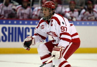 WASHINGTON - APRIL 11:  Matt Gilroy #97 of the Boston Terriers plays defense against the Miami Red Hawks during the NCAA Men's Frozen Four Championship game on April 11, 2009 at the Verizon Center in Washington, DC. The Boston Terriers defeated the Miami Red Hawks 4-3 in overtime to win the national title.  (Photo by Elsa/Getty Images)