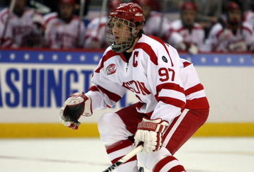 WASHINGTON - APRIL 11:  Matt Gilroy #97 of the Boston Terriers plays defense against the Miami Red Hawks during the NCAA Men's Frozen Four Championship game on April 11, 2009 at the Verizon Center in Washington, DC. The Boston Terriers defeated the Miami Red Hawks 4-3 in overtime to win the national title.  (Photo by Elsa/Getty Images)