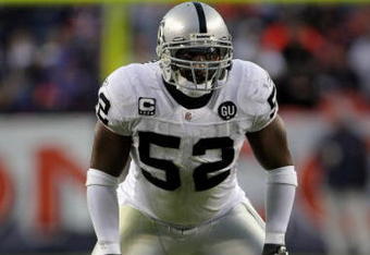 DENVER - NOVEMBER 23:  Linebacker Kirk Morrison #52 of the Oakland Raiders defends against the Denver Broncos during week 12 NFL action at Invesco Field at Mile High on November 23, 2008 in Denver, Colorado. The Raiders defeated the Broncos 31-10.  (Photo by Doug Pensinger/Getty Images)