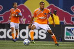 EAST RUTHERFORD, NJ - MAY 16:  Ricardo Clark #13 of the Houston Dynamo plays the ball against the New York Red Bulls at Giants Stadium in the Meadowlands on May 16, 2009 in East Rutherford, New Jersey. Houston and New York play to a 1-1 Tie.  (Photo by Mike Stobe/Getty Images for New York Red Bull)