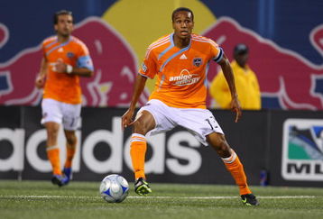 EAST RUTHERFORD, NJ - MAY 16:  Ricardo Clark #13 of the Houston Dynamo plays the ball against the New York Red Bulls at Giants Stadium in the Meadowlands on May 16, 2009 in East Rutherford, New Jersey. Houston and New York play to a 1-1 Tie.  (Photo by Mike Stobe/Getty Images for New York Red Bull)