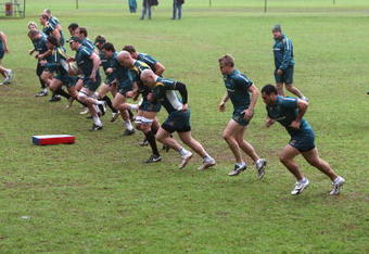 CAPE TOWN, SOUTH AFRICA - AUGUST 06:  The Wallabies warm up during the Australian Wallabies training session held at Westerford High School on August 6, 2009 in Cape Town, South Africa.  (Photo by David Rogers/Getty Images)