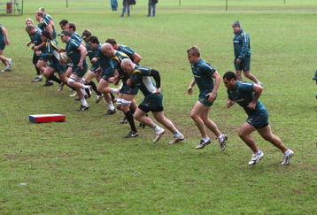 CAPE TOWN, SOUTH AFRICA - AUGUST 06:  The Wallabies warm up during the Australian Wallabies training session held at Westerford High School on August 6, 2009 in Cape Town, South Africa.  (Photo by David Rogers/Getty Images)