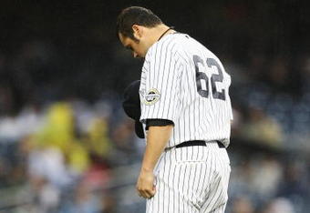 NEW YORK - JUNE 18:  Joba Chamberlain #62 of The New York Yankees prays before pitching against The Washington Nationals during their game on June 18th, 2009 at Yankee Stadium in the Bronx Borough of New York.  (Photo by Al Bello/Getty Images)