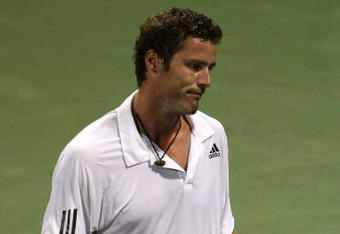 LOS ANGELES, CA - JULY 31:  Marat Safin of Russia reacts to losing a point during the match against Tommy Haas of Germany on Day 5 of the LA Tennis Open at the Los Angeles Tennis Center - UCLA on July 31, 2009 in Los Angeles, California.  (Photo by Stephen Dunn/Getty Images)