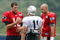 FOXBORO, MA - JULY 31:  Quarterback Tom Brady #12 of the New England Patriots talks with teammates Julian Edelman #11 and Matt  Gutierrez #7 during training camp on July 31, 2009 at Gillette Stadium in Foxboro, Massachusetts.  (Photo by Elsa/Getty Images)