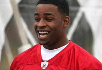 SANTA CLARA, CA - MAY 01:  Michael Crabtree #15 of the San Francisco 49ers looks on at practice during the 49ers Minicamp at their training facilities on May 1, 2009 in Santa Clara, California. Crabtree was the 49ers first round draft pick.  (Photo by Jed Jacobsohn/Getty Images)