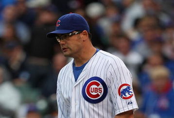 CHICAGO - JULY 08: Kevin Gregg #63 of the Chicago Cubs reacts after throwing a wild pitch in the 9th inning that allowed an Atlanta Braves runner to score on July 8, 2009 at Wrigley Field in Chicago, Illinois. The Braves defeated the Cubs 4-1. (Photo by Jonathan Daniel/Getty Images)