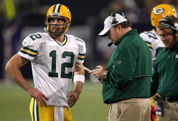 MINNEAPOLIS - NOVEMBER 09:  Quarterback Aaron Rodgers #12 and head coach Mike McCarthy of the Green Bay Packers confer against the Minnesota Vikings on November 9, 2008 at the Metrodome in Mineapolis, Minnesota.  The Vikings won 28-27.  (Photo by Stephen Dunn/Getty Images)