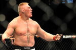 LAS VEGAS - JULY 11:  Brock Lesnar reacts after knocking out Frank Mir during their heavyweight title bout during UFC 100 on July 11, 2009 in Las Vegas, Nevada.  (Photo by Jon Kopaloff/Getty Images)