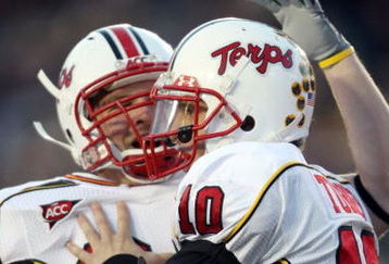 CHESTNUT HILL, MA - NOVEMBER 29:  Chris Turner #10 of the Maryland Terrapins celebrates his touchdown with teammate Cory Jackson #38 in the first quarter against the Boston College Eagles on November 29, 2008 at Alumni Stadium in Chestnut Hill, Massachusetts.  (Photo by Elsa/Getty Images)