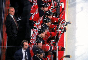 23 Dec 1997: Coach Jacques Lemaire of the New Jersey Devils looks on from the bench during a game against the Washington Capitals at the MCI Center in Washington, D.C. The Devis tied the Capitals 1-1.