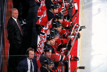 23 Dec 1997: Coach Jacques Lemaire of the New Jersey Devils looks on from the bench during a game against the Washington Capitals at the MCI Center in Washington, D.C. The Devis tied the Capitals 1-1.
