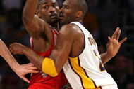 LOS ANGELES, CA - MAY 17:  Kobe Bryant #24 of the Los Angeles Lakers is covered by Ron Artest #96 of the Houston Rockets in the third quarter of Game Seven of the Western Conference Semifinals during the 2009 NBA Playoffs at Staples Center on May 17, 2009 in Los Angeles, California. NOTE TO USER: User expressly acknowledges and agrees that, by downloading and or using this photograph, User is consenting to the terms and conditions of the Getty Images License Agreement.  (Photo by Stephen Dunn/Getty Images)