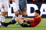 BLOEMFONTEIN, SOUTH AFRICA - JUNE 24: Landon Donovan #10 of USA gets a yellow card from referee Jorge Larrionda of Uruguay for a foul against Xabi Alonso #14 of Spain during the FIFA Confederations Cup Semi Final match between Spain and USA at the Free State stadium on June 24, 2009 in Bloemfontein, South Africa. USA won, 2-0, to advance to the finals.  (Photo by Kevork Djansezian/Getty Images)