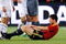 BLOEMFONTEIN, SOUTH AFRICA - JUNE 24: Landon Donovan #10 of USA gets a yellow card from referee Jorge Larrionda of Uruguay for a foul against Xabi Alonso #14 of Spain during the FIFA Confederations Cup Semi Final match between Spain and USA at the Free State stadium on June 24, 2009 in Bloemfontein, South Africa. USA won, 2-0, to advance to the finals.  (Photo by Kevork Djansezian/Getty Images)