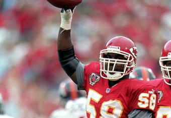 19 Sep 1999: Derrick Thomas #58 of the Kansas City Chiefs celebrates the recovered fumble during the game against the Denver Broncos at the Arrowhead Stadium in Kansas City, Missouri. The Chiefs defeated the Broncos 26-10. Mandatory Credit: Elsa Hasch  /Allsport