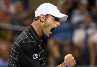 WASHINGTON - AUGUST 06:  Andy Roddick celebrates a point in the final game against Sam Querrey during Day 4 of the Legg Mason Tennis Classic at the William H.G. FitzGerald Tennis Center on August 6, 2009 in Washington, DC.  (Photo by Jim McIsaac/Getty Images)
