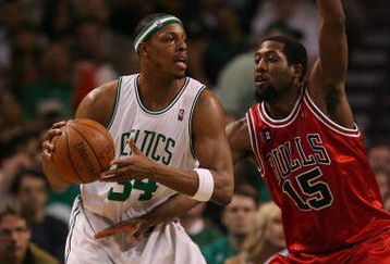 BOSTON - MAY 02:  Paul Pierce #34 of the Boston Celtics looks to pass as John Salmons #15 of the Chicago Bulls defends in Game Seven of the Eastern Conference Quarterfinals during the 2009 NBA Playoffs at TD Banknorth Garden on May 2, 2009 in Boston, Massachusetts. The Celtics defeated the Bulls 109-99. NOTE TO USER: User expressly acknowledges and agrees that, by downloading and or using this photograph, User is consenting to the terms and conditions of the Getty Images License Agreement.  (Photo by Elsa/Getty Images)