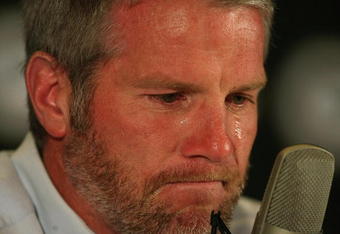GREEN BAY, WI - MARCH 6: Quarterback Brett Favre of the Green Bay Packers announces his retirement at a press conference at Lambeau Field March 6, 2008 in Green Bay, Wisconsin. (Photo by Jonathan Daniel/Getty Images)